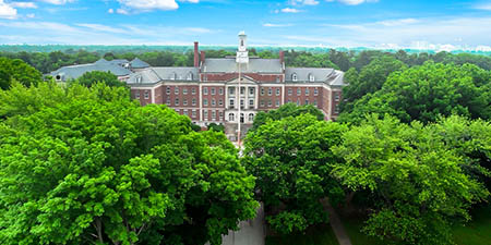 The_Grove_at_Cold_Spring_Images_450x225_0006_TGAAC-Property-Aerial-Front-View-Best-June2026-Master-1200x674